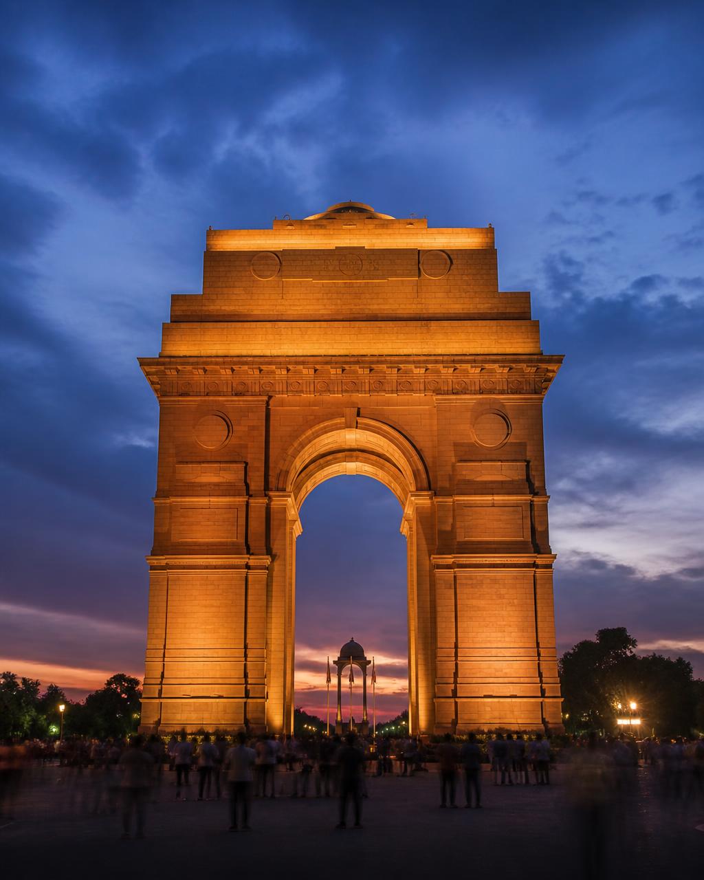 India Gate illuminated at dusk in New Delhi