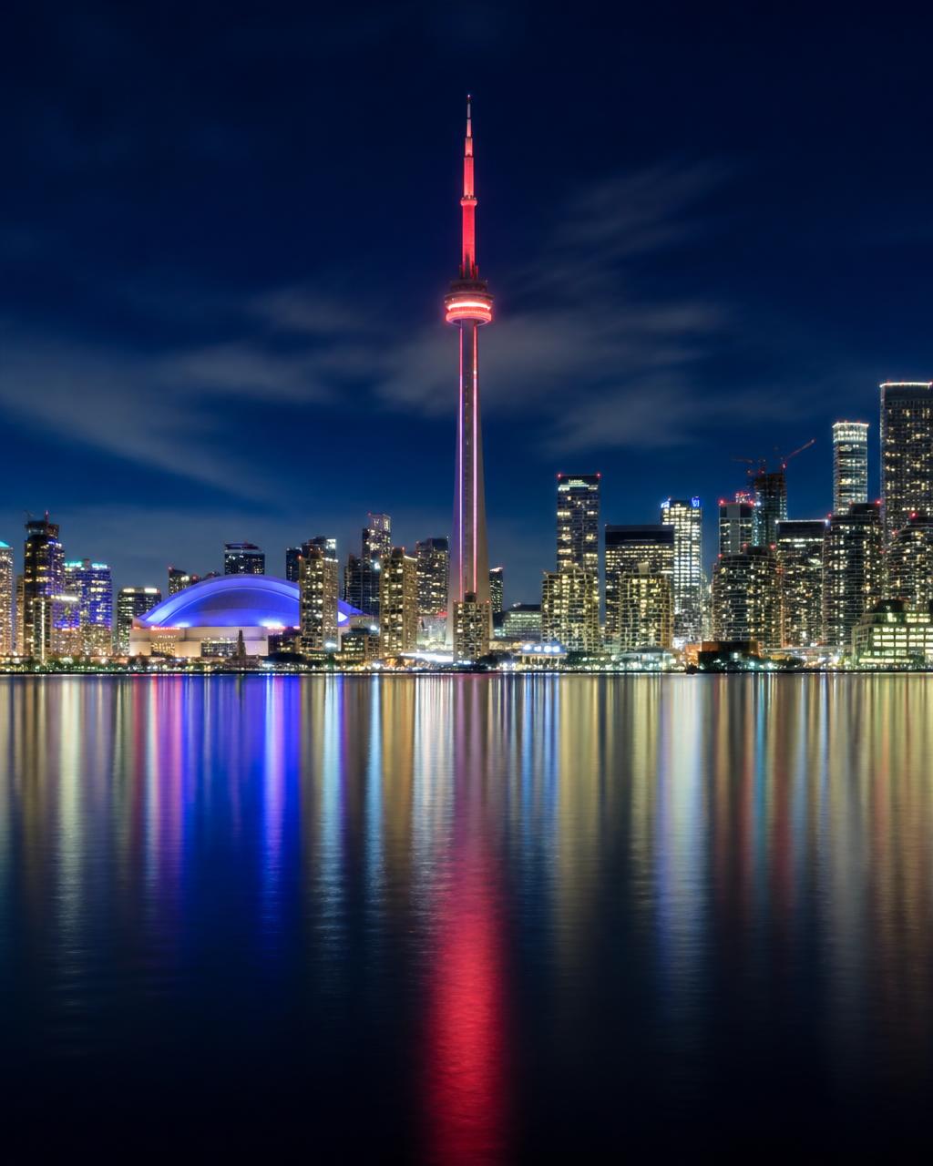Toronto skyline with the CN Tower reflected in Lake Ontario